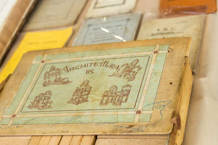 CESENA (FC) - FEBRUARY 16, 2020: lights are enlightening ancient and old books for sale at antiques...