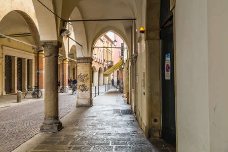 PADOVA, ITALY - FEBRUARY 23, 2019: tourists are walking in typical street of historical center