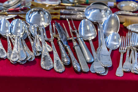 CESENA (FC) - FEBRUARY 17, 2019: lights are enlightening cutlery for sale on stalls at antique fairのeditorial素材
