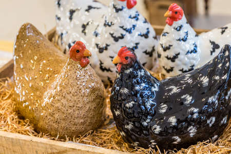 CESENA (FC) - FEBRUARY 17, 2019: lights are enlightening  statue of chickens for sale on stalls at antique fairのeditorial素材