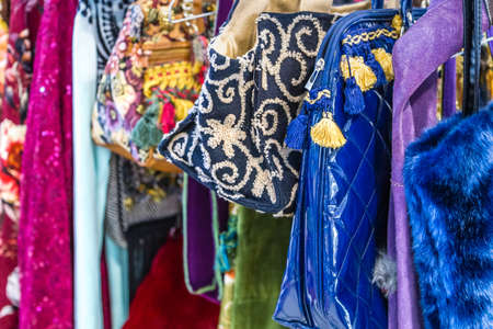CESENA (FC) - FEBRUARY 17, 2019: lights are enlightening dresses for sale on stalls at antique fair