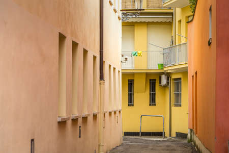PADOVA, ITALY - FEBRUARY 23, 2019: sunlight is enlightening typical architecture of buildings in historical center in Padovaのeditorial素材