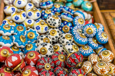 CESENA (FC) - FEBRUARY 16, 2020: lights are enlightening door handles for sale on stalls at antiques fairのeditorial素材