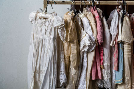 CESENA (FC) - FEBRUARY 17, 2019: lights are enlightening female dresses for sale on stalls at antique fairのeditorial素材