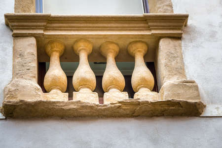 window with amphoras in ancient buildingの写真素材