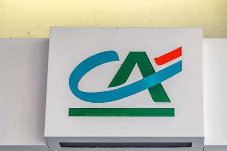 PADOVA, ITALY - FEBRUARY 23, 2019: sunlight is enlightening logo of Credit Agricole on storefront of bank in historical centerのeditorial素材