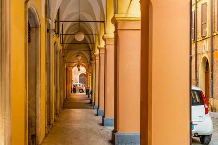 MODENA (MO), ITALY - FEBRUARY 15, 2019: people walking in the street of the historical center of Modenaのeditorial素材