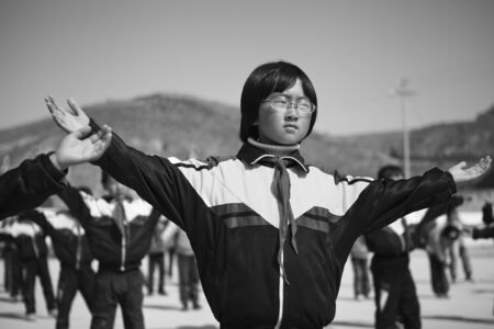 Student doing morning exercises before class startsのeditorial素材