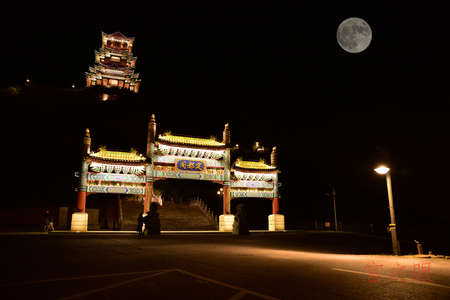 Landscape view of an entrance arch during the nightのeditorial素材