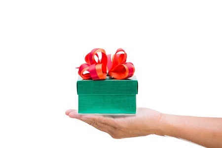 Green gift box with hand の写真素材