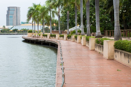 walkway beside the lake in Bangkok public parkの写真素材