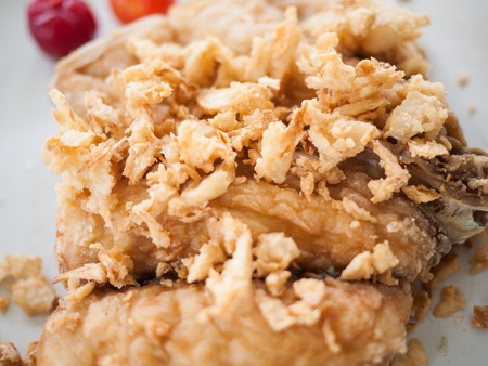 Fried fish with Garlic. usually eat with chili sauce and rice の写真素材