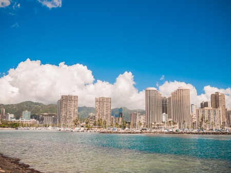 HONOLULU, HAWAII - FEB 2, View of Waikiki Yacht club from Ala Moana beach park with buildings behind の写真素材