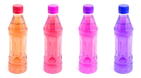 Bottles of Fruit Juices on White Background の写真素材