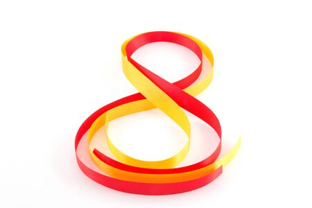 Orange and yellow ribbon isolated on white background