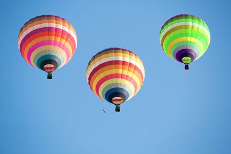Colorful hot air balloons on the blue skyの写真素材