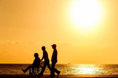 disabled in a wheel chair  Silhouettesの写真素材