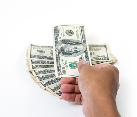 Hand with money, 100 dollar bills