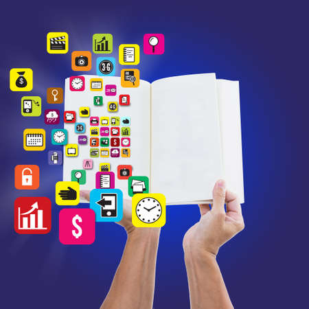 Man hand holding open book with infographic icons