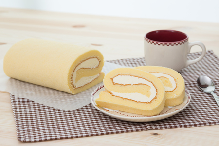 Rollcake with coffee cupの写真素材