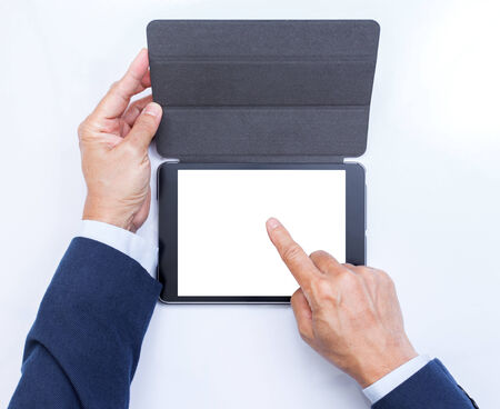 Businessman hands with tablet computer on white background