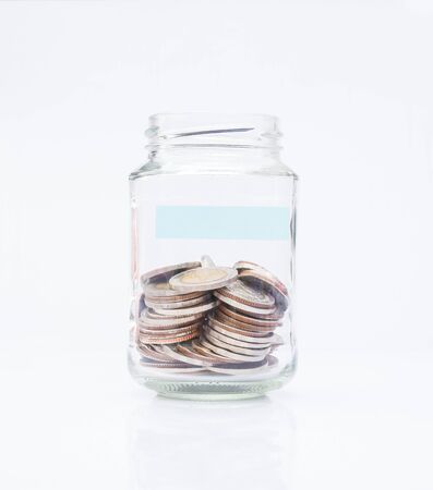 Coins in bottle with labelの写真素材