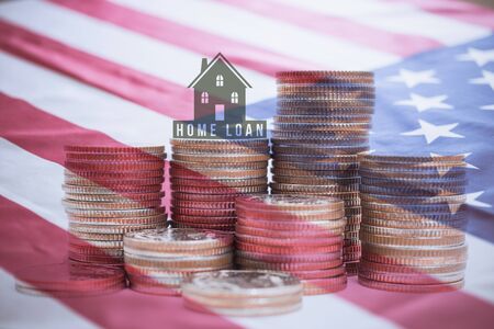 Double exposure of stack coins and american flag. business home loan conceptの写真素材