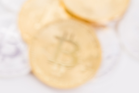 Blur image of gold Bitcoinの写真素材
