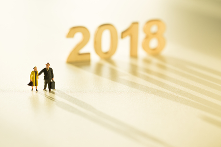 Business people minature and wood number of year 2018の写真素材