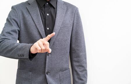 Businessman hand pointing on white backgroundの写真素材