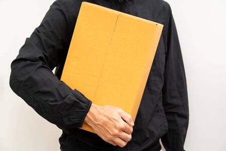 Unrecognized man delivery box of parcelの写真素材
