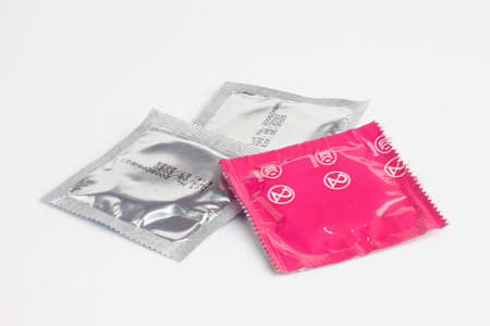 condoms  isolated on white backgroundの写真素材