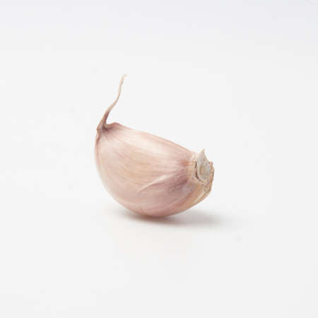 garlic isolated on white backgroundの写真素材