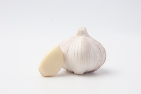 garlic isolated on white backgroundの写真素材