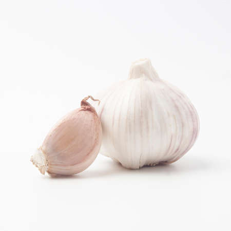 garlic isolated on white backgroundの写真素材