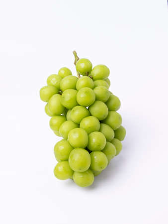 green grape isolated on white backgroundの写真素材