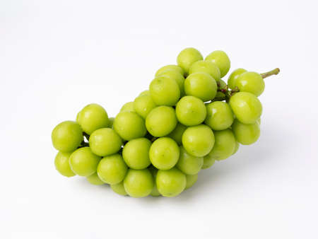 green grape isolated on white backgroundの写真素材