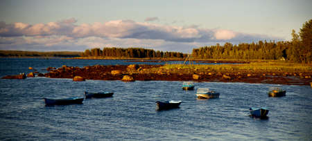 White Sea shore landscape with boatsの写真素材