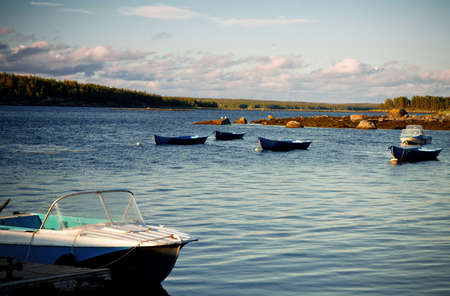 White Sea shore landscape with boatsの写真素材