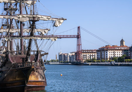 ship docked in port with calm sea