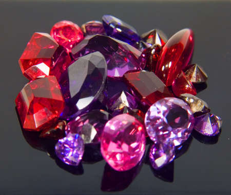  faceted stones on a dark backgroundの写真素材