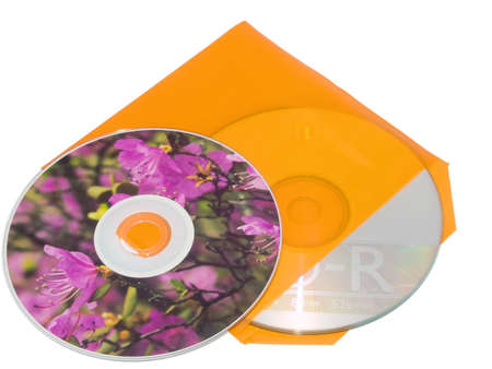 compact disks and envelope on white background