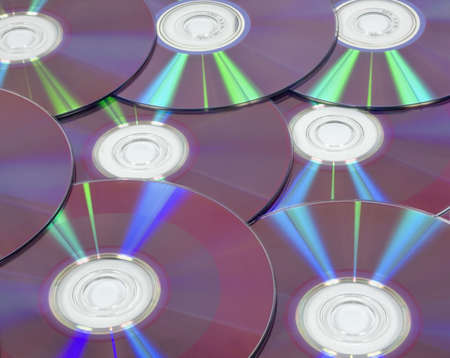 Background from DVD disks with colour reflexionsの写真素材
