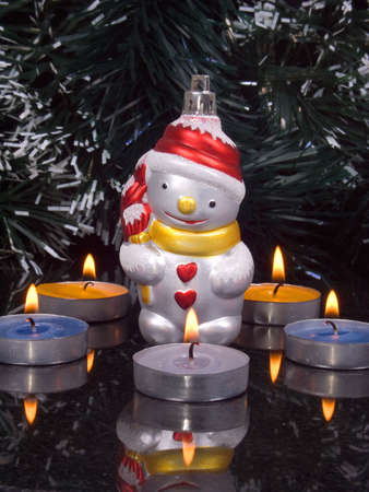 decoration for fir tree and candles on black backgroundの写真素材