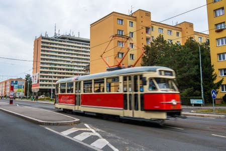 Family with mask is crossing the street at Hradcanska metro station during quarantine period due to outbreak of COVID-19 as winter is starting. Prague, Czech Republicのeditorial素材