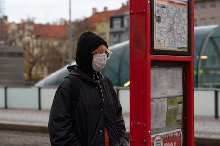 11-23-2020. Prague, Czech Republic. People walking and talking outside during coronavirus (COVID-19)...