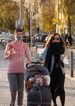 11-23-2020. Prague, Czech Republic. People walking and talking outside during coronavirus (COVID-19)...