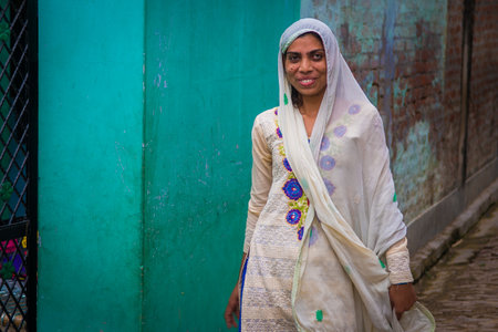 Woman in India has many responsibilities as taking care of their children, cooking, washing, working, also receiving training for income generating activitiesのeditorial素材