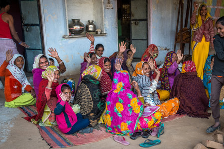 Woman in India has many responsibilities as taking care of their children, cooking, washing, working, also receiving training for income generating activitiesのeditorial素材