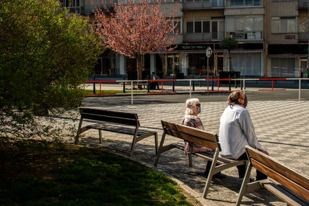Editorial â December 15thPrague, Czech Republic. 01-11-2020. Tourists are walking on the Charles Bridge on the Historical town.Man selling on his gift shop at the charles bridge.のeditorial素材